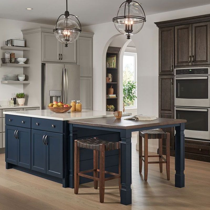 A kitchen with a sophisticated color scheme and high-end finishes