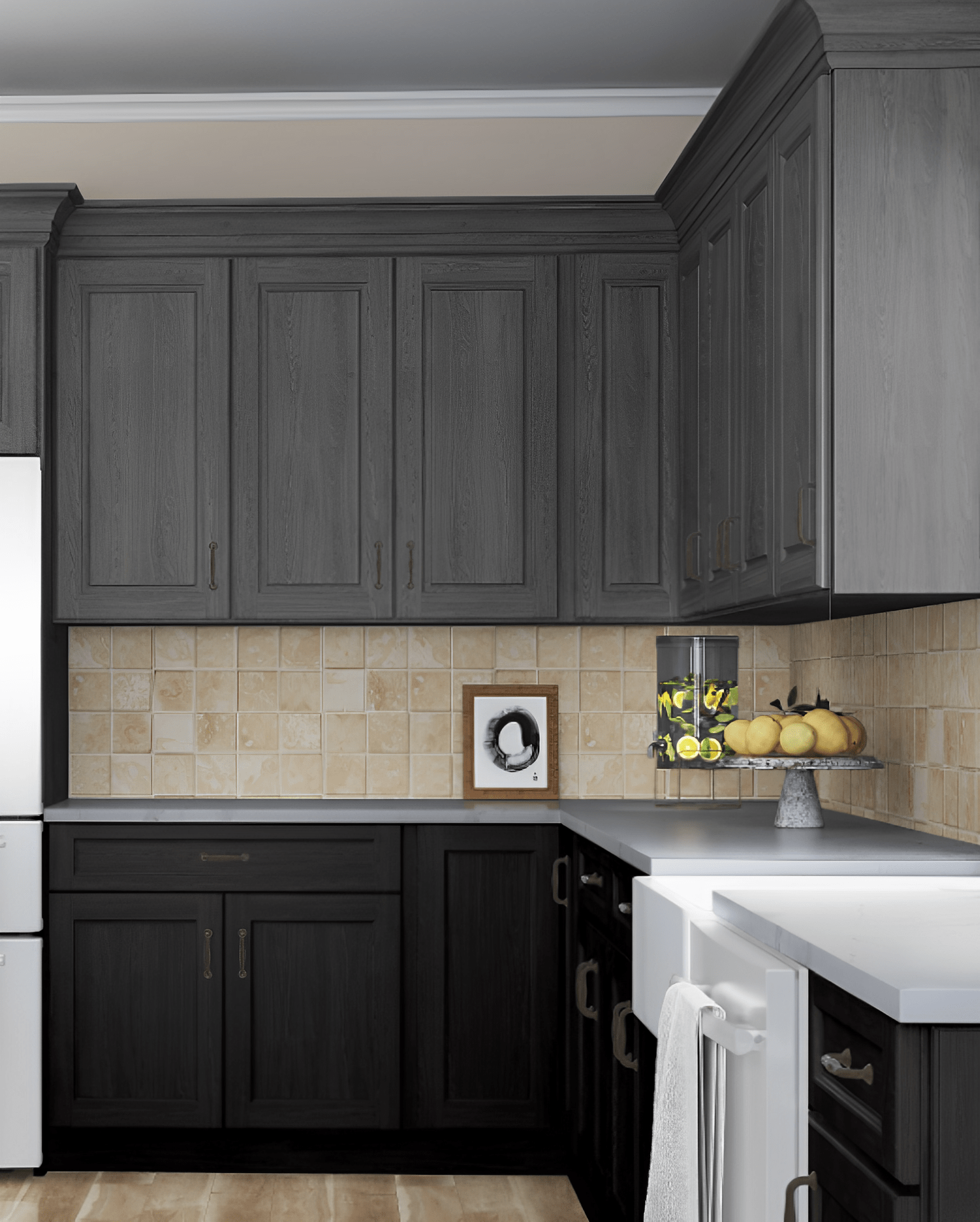 A kitchen with black cabinets and a white refrigerator