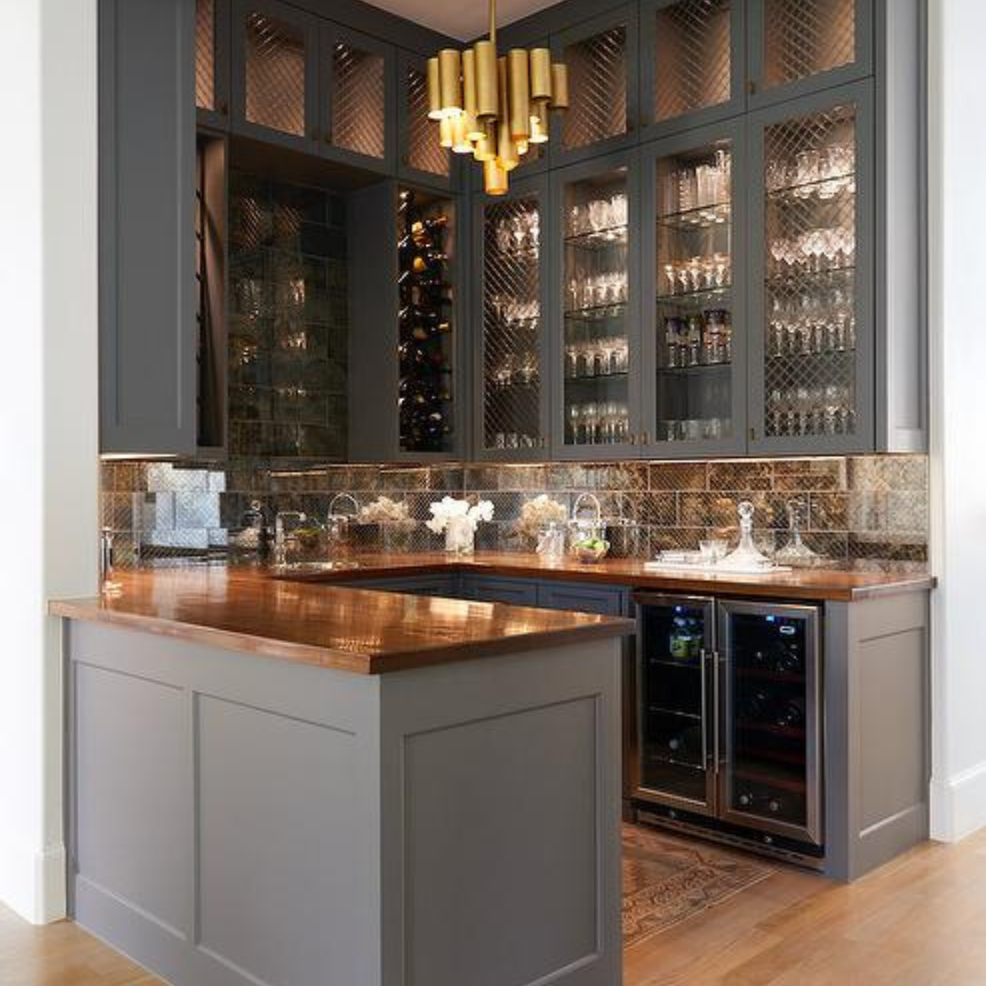 A kitchen with a large island and lots of cabinets