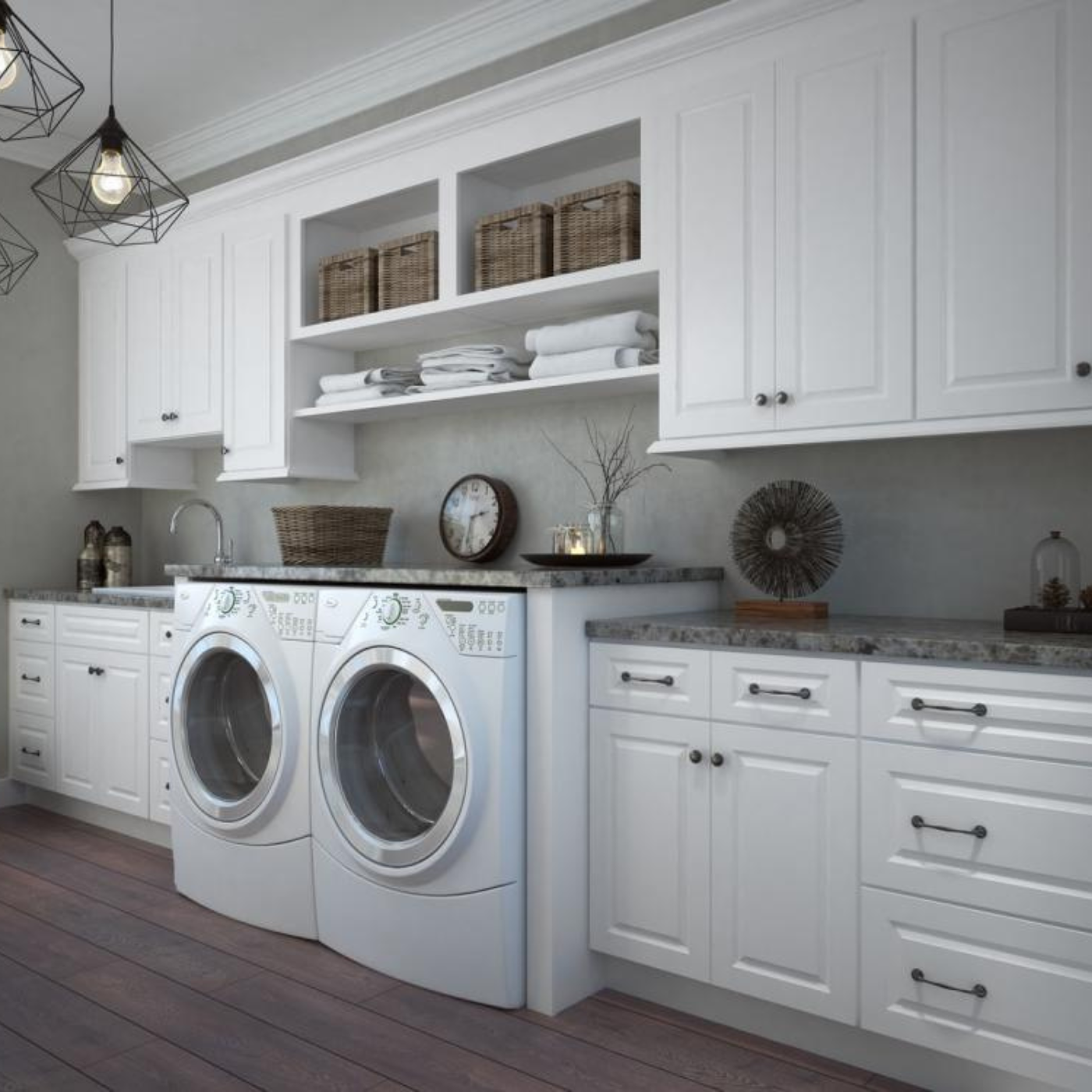 A laundry room with white cabinets and a washer and dryer