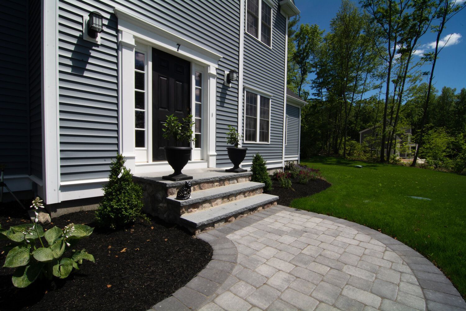 A house with steps leading up to the front door