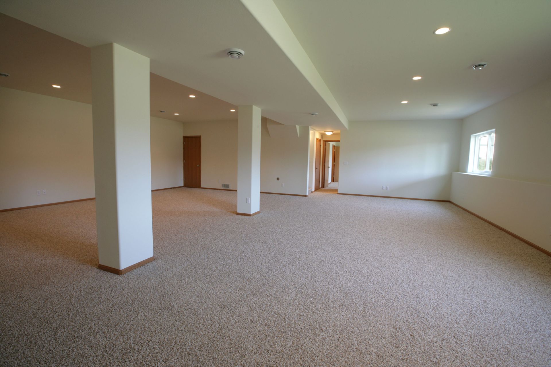 A big carpeted basement room