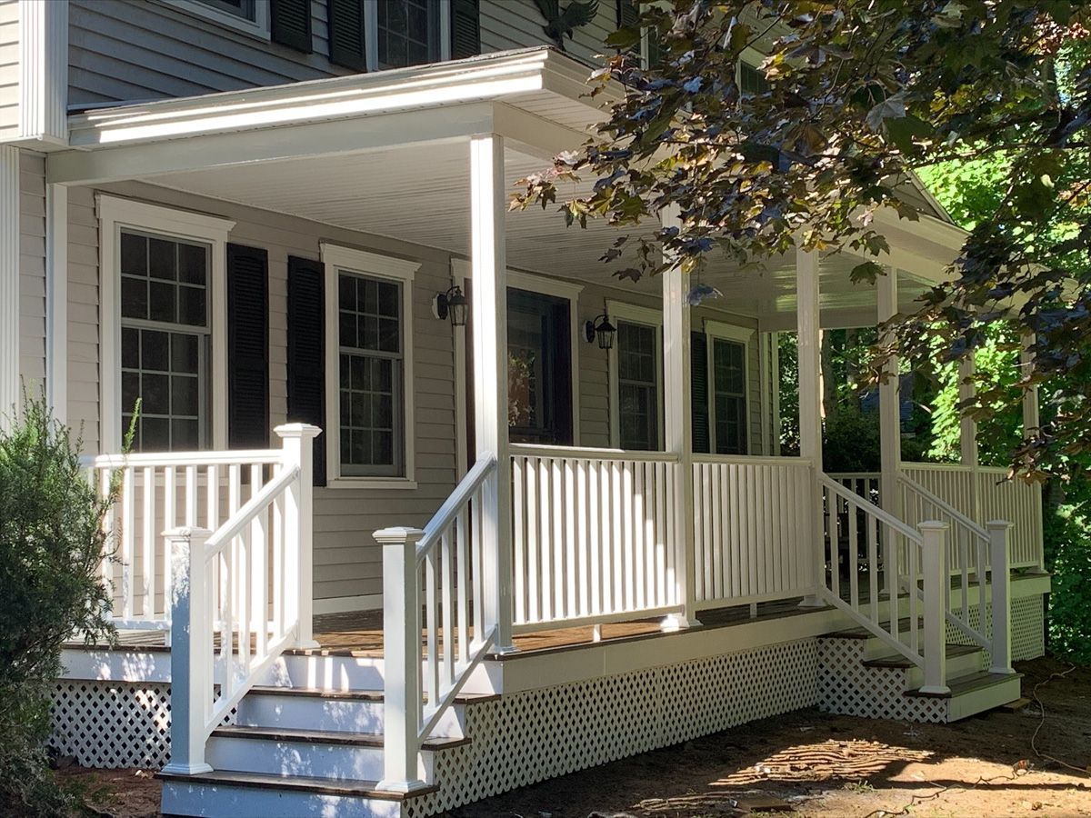 A house with a large porch and stairs