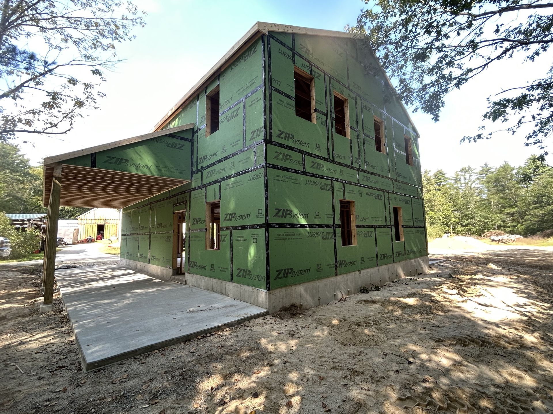 A house is being built in the middle of a forest.
