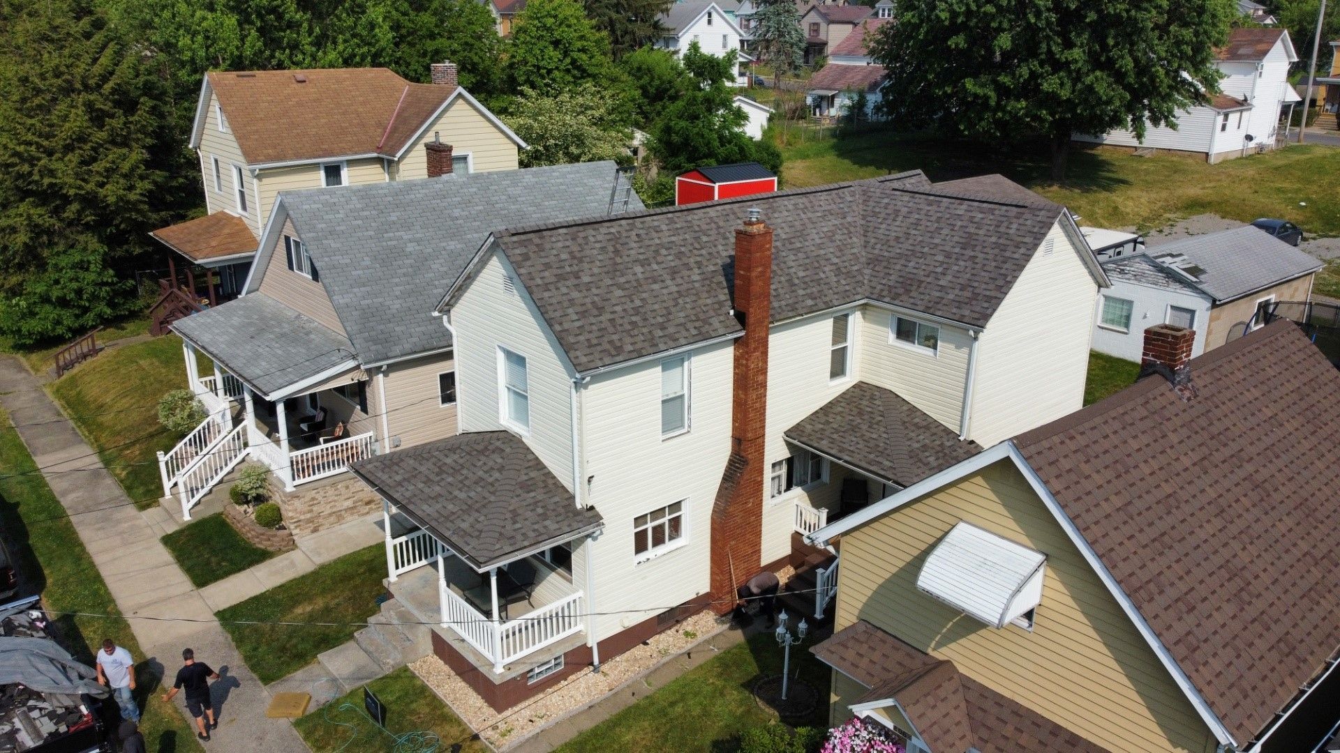 An aerial view of a row of houses in a residential area.