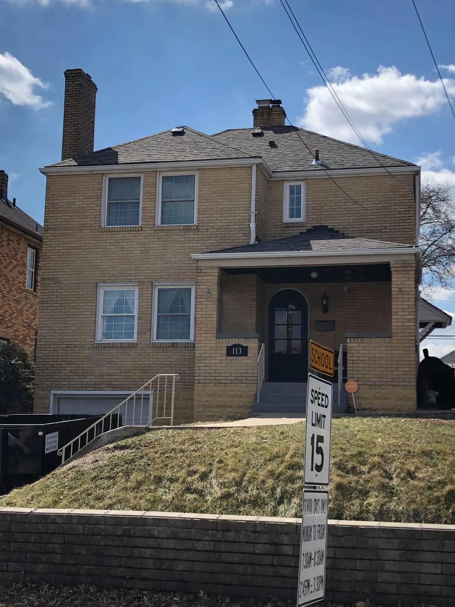 A house with a sign in front of it that says 25