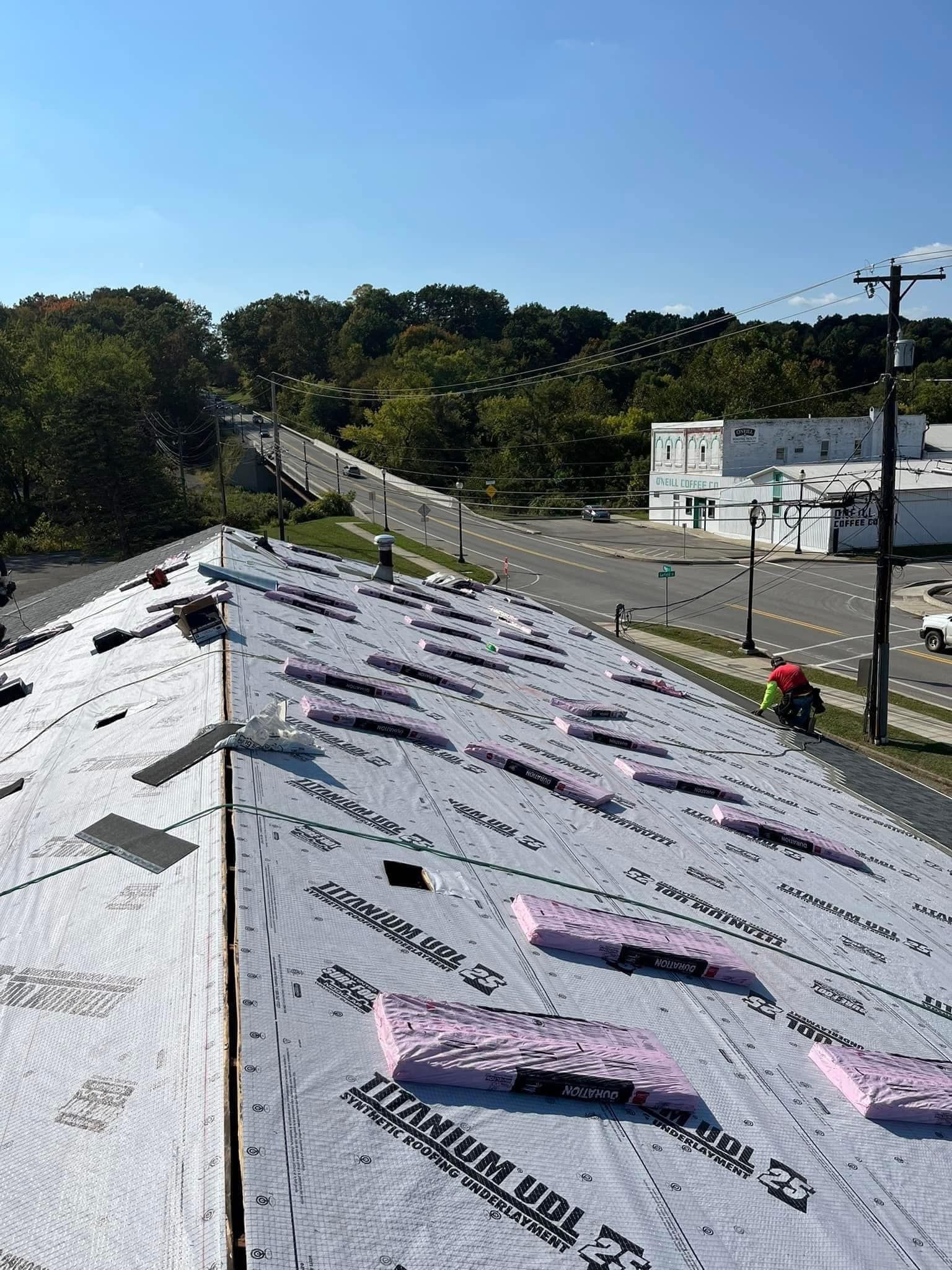 An aerial view of a roof with a lot of foam on it.