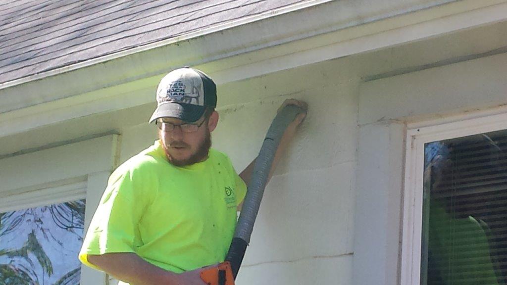Man doing insulation work