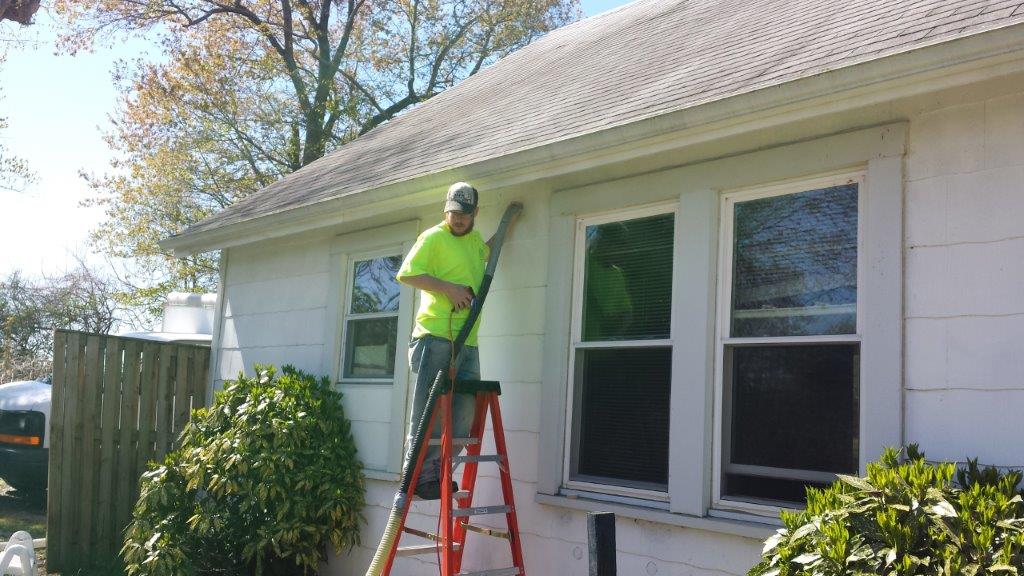 Man doing insulation work