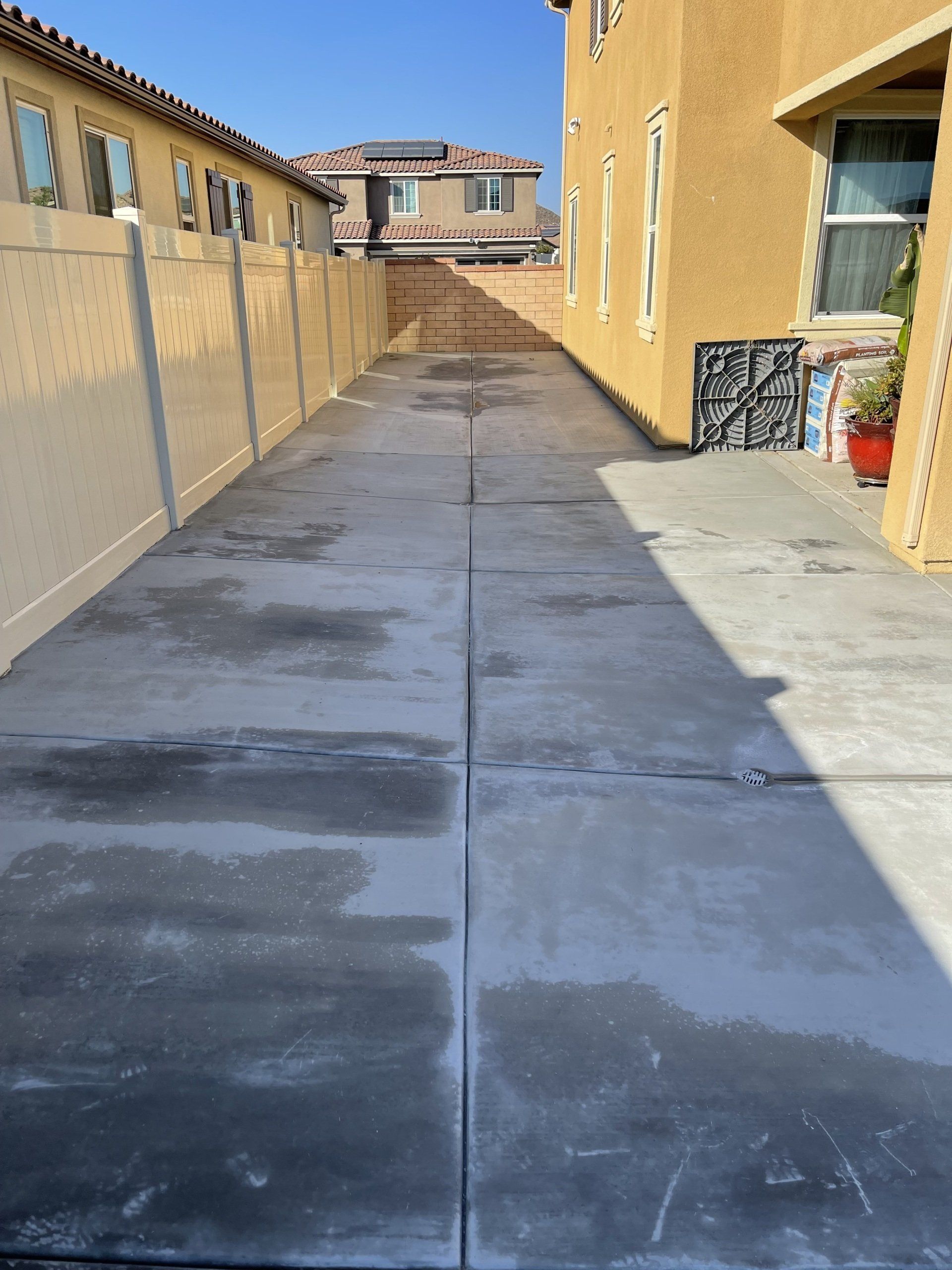 semi finished house walkway with white fence