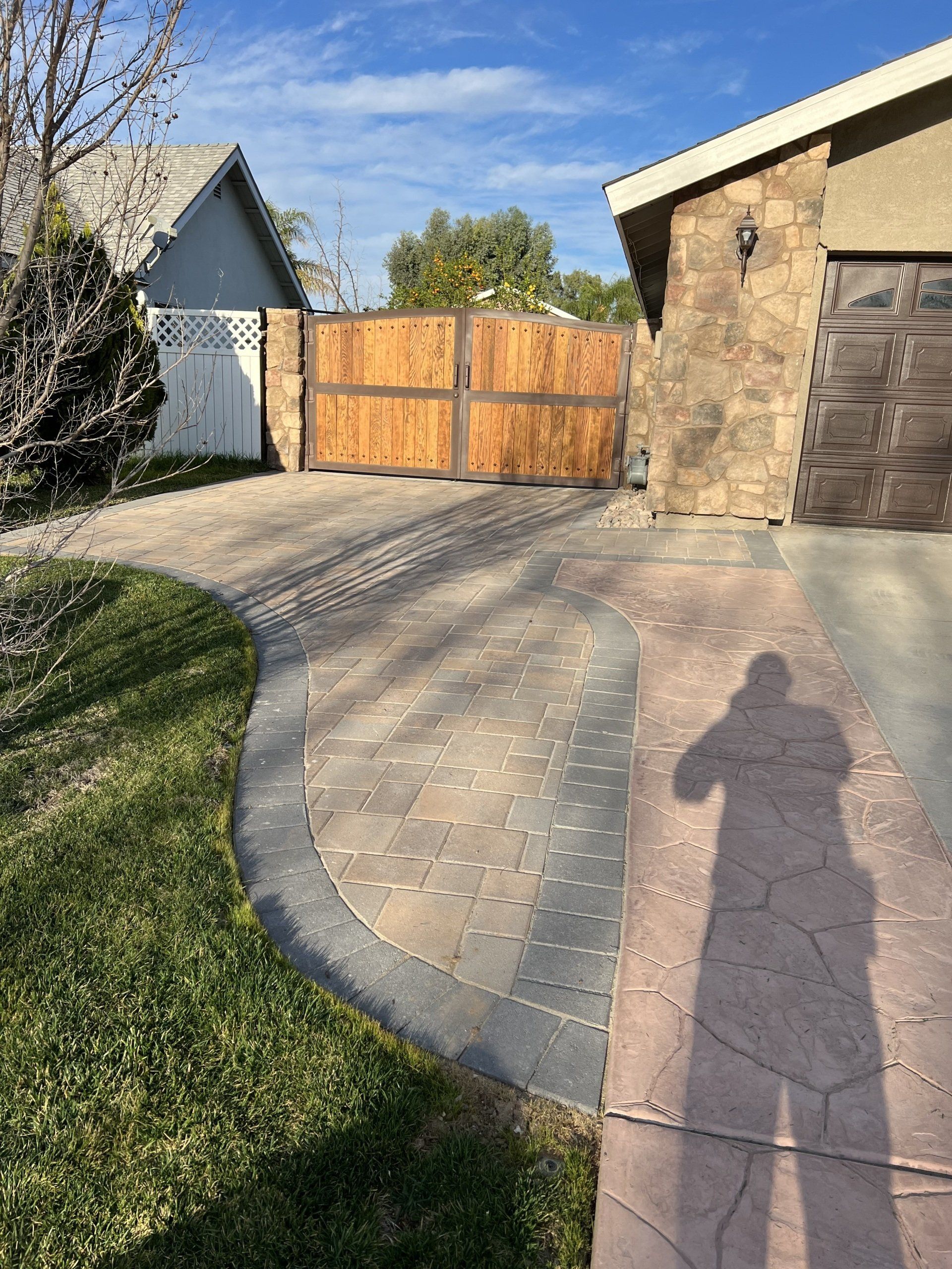 light red, gray and multi colored tile front gate walkway
