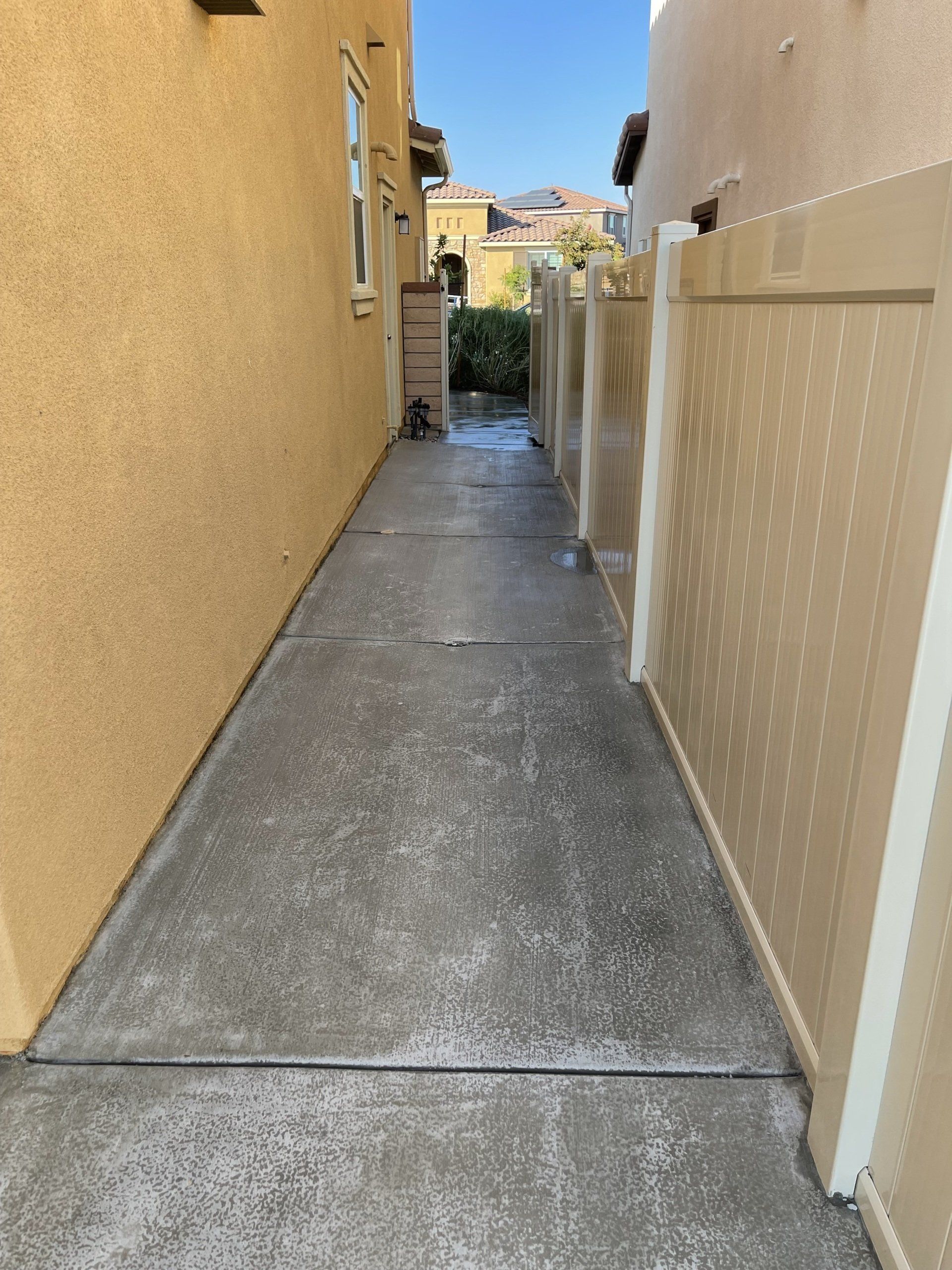 semi finished walkway with cream fence