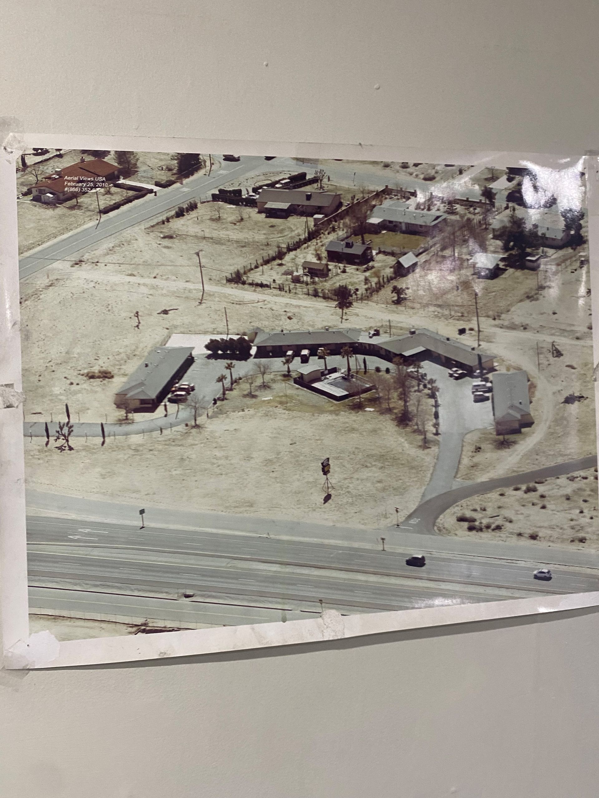 An aerial view of a the motel in the desert
