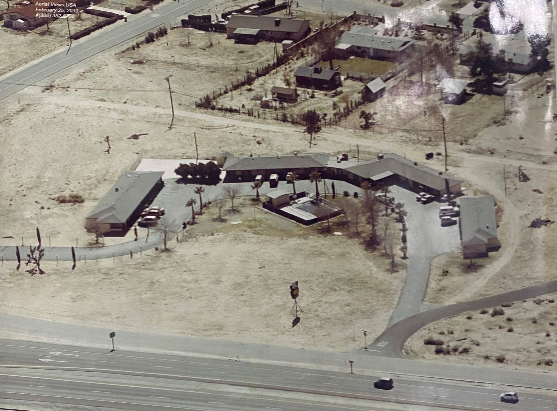 An aerial view of a the motel in the desert