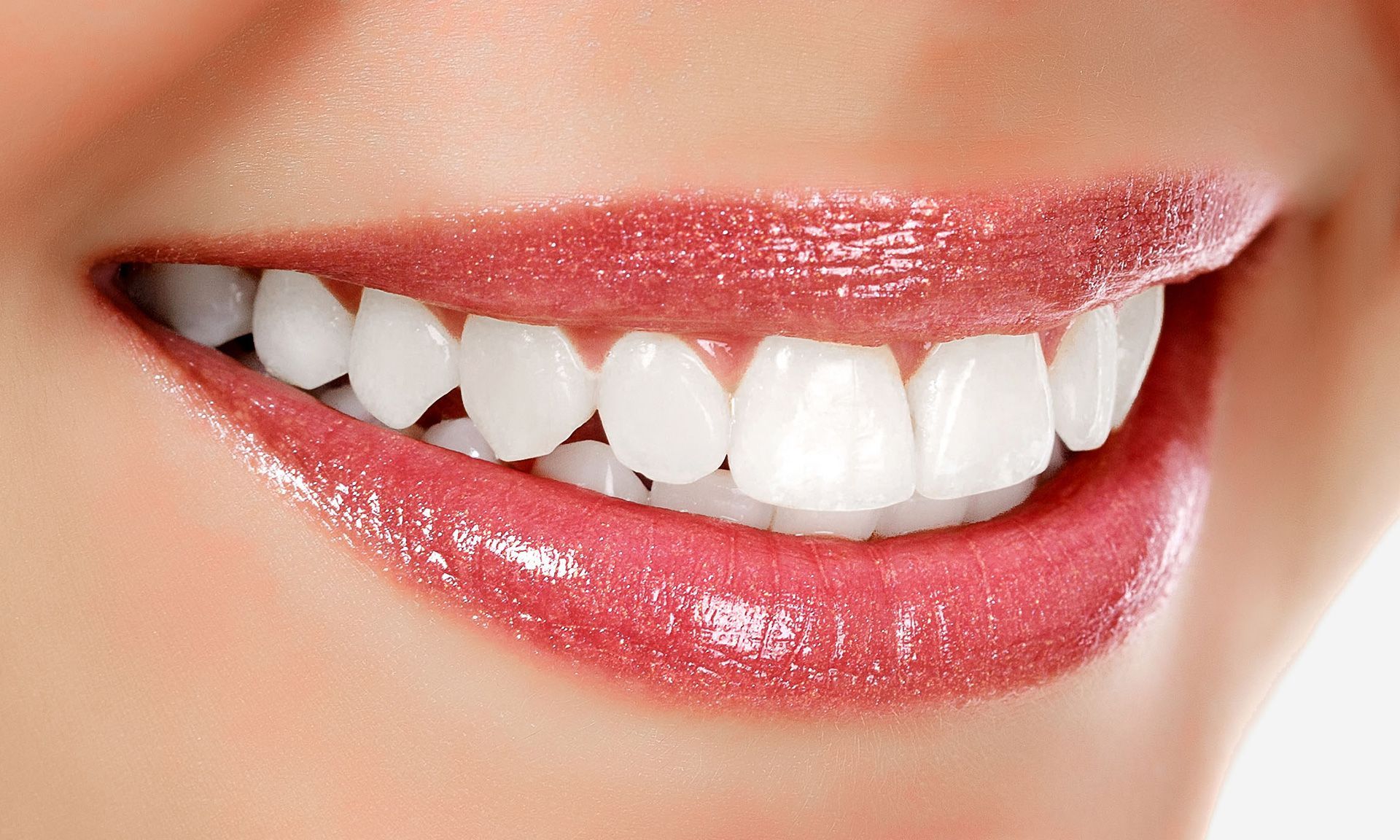 Learn more about Cosmetic Treatments Woman smiling