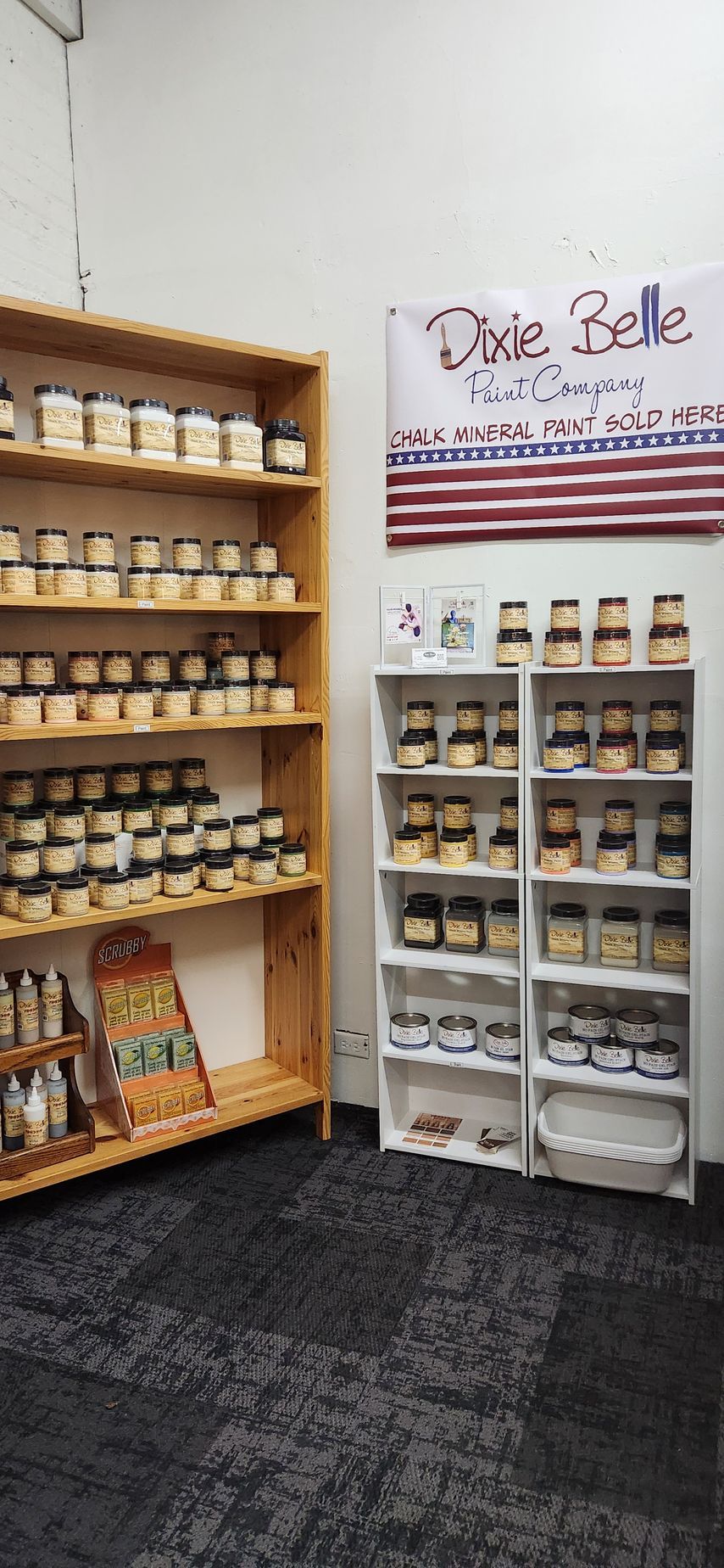 A room filled with shelves filled with jars of food.