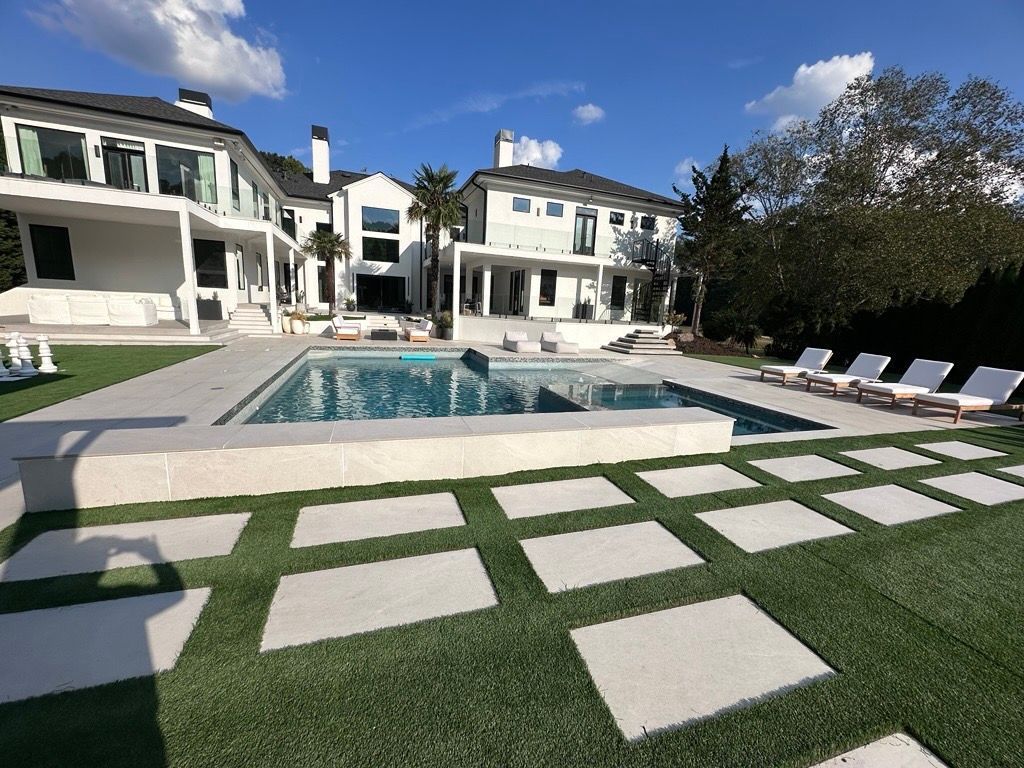 Big white house with swimming pool