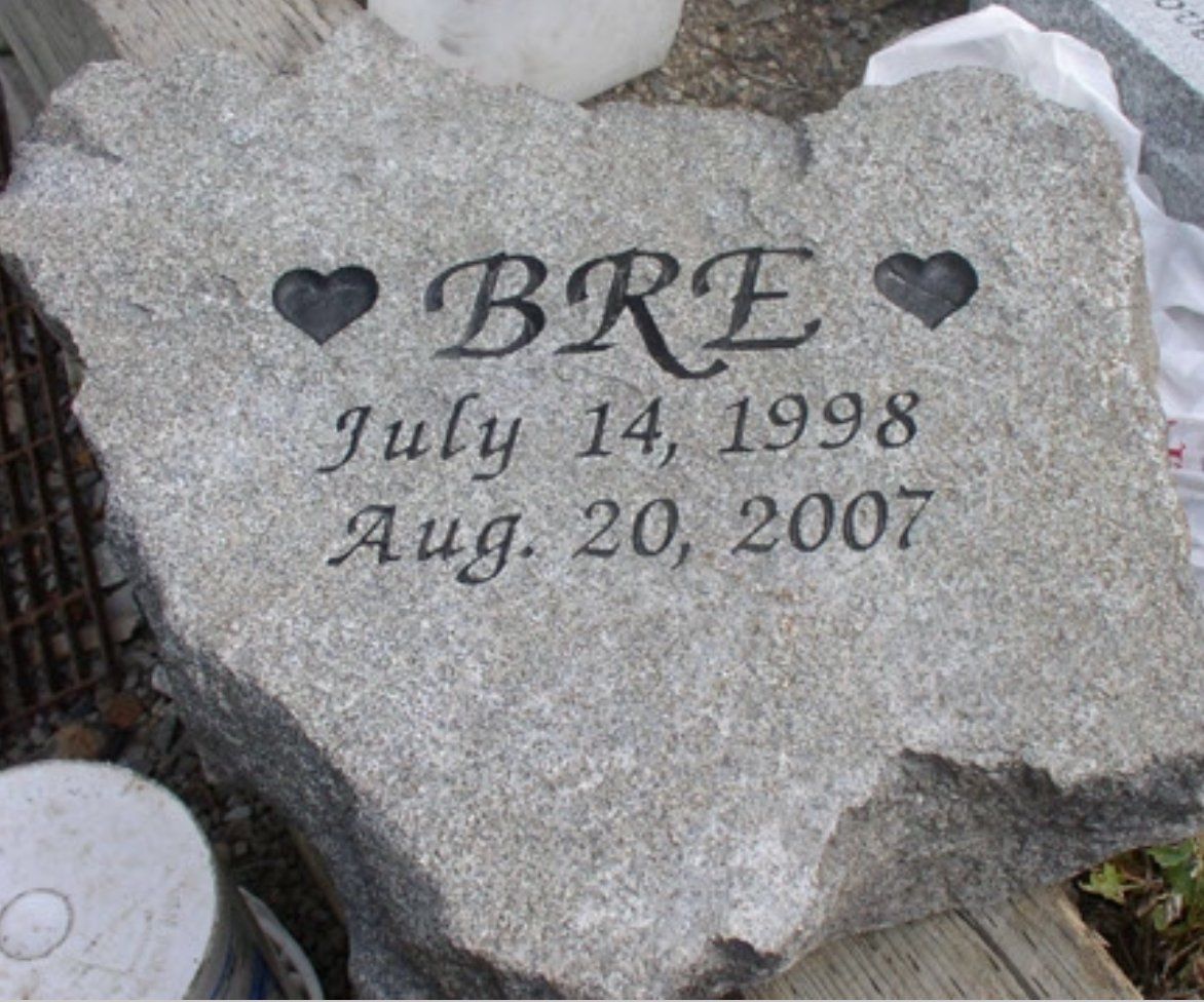 A gravestone with the name bre written on it