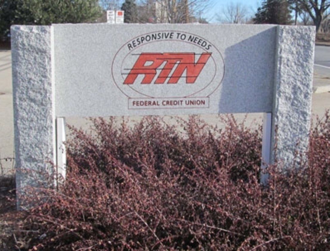 A sign for the federal credit union says responsive to needs