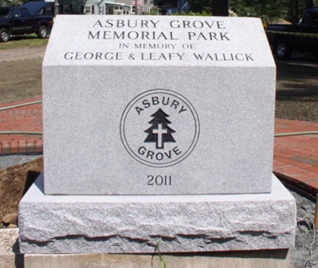 A memorial stone for george & leafy wallick in 2011