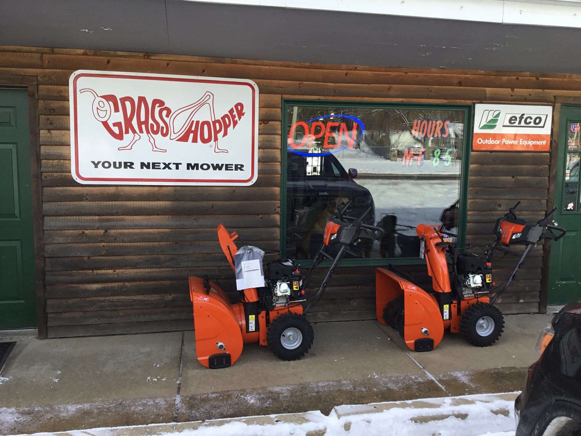 Kellogg's Repair & Motorsports storefront with lawn equipment