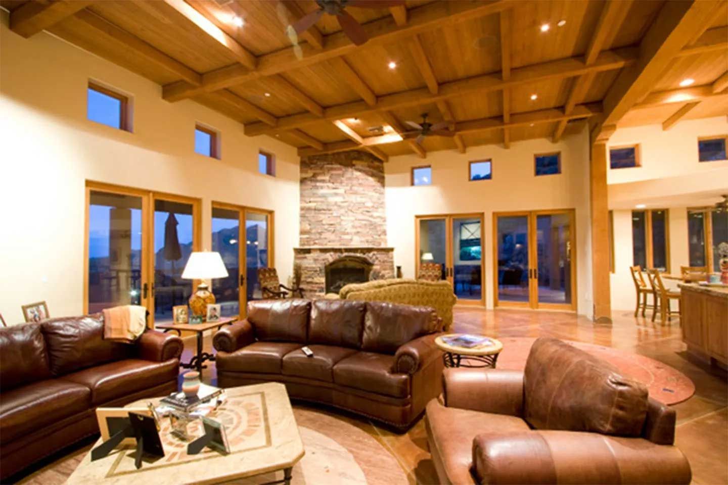 A living room filled with furniture and a fireplace