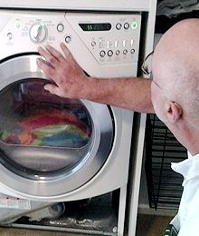 Technician checking the washer