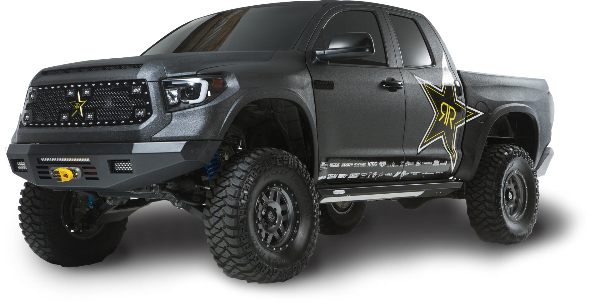 Black Toyota Tundra truck with Rockstar Energy drink logo, lifted suspension, and off-road tires.