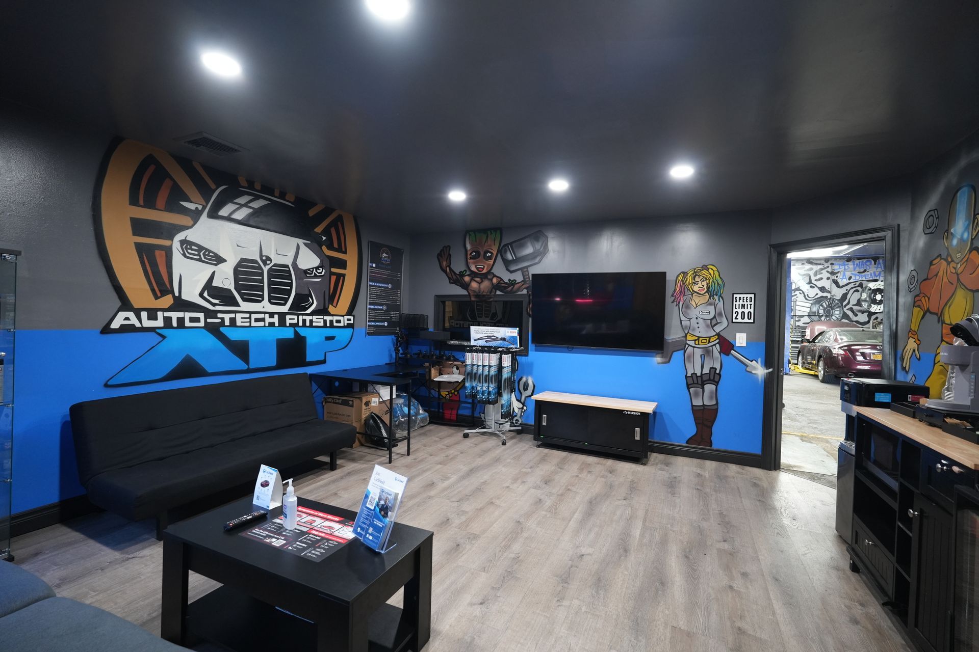 A living room with a couch , table , and television.