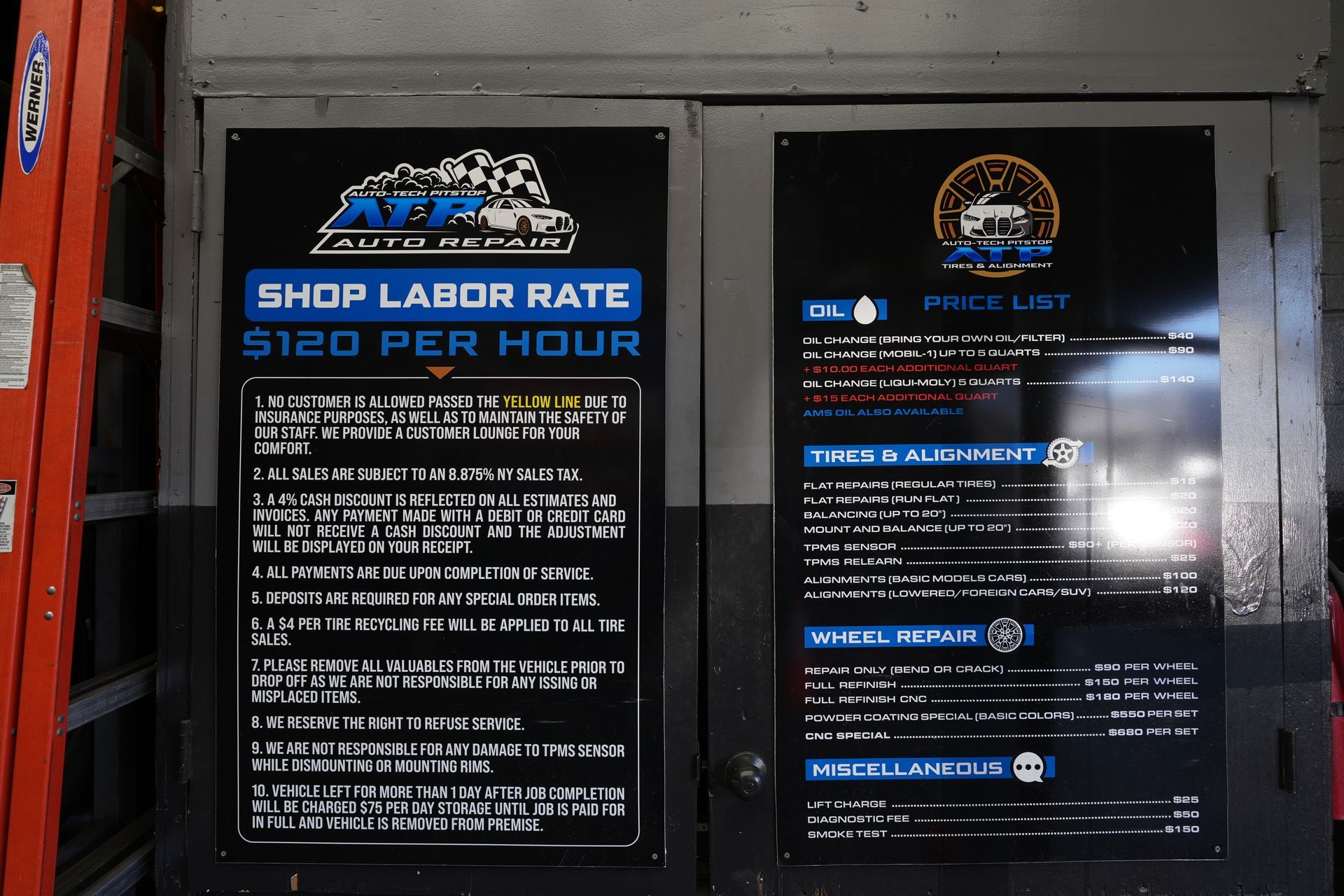 A sign that says shop labor rate $ 120 per hour