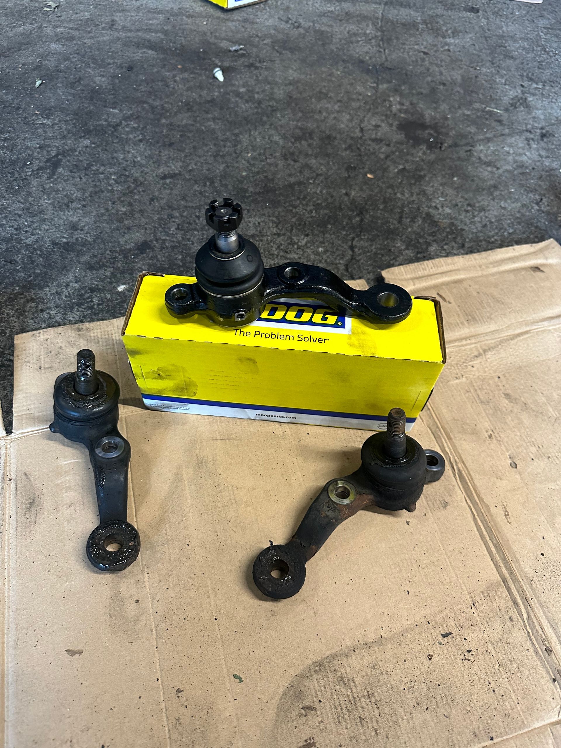 A yellow box with a lot of parts on it