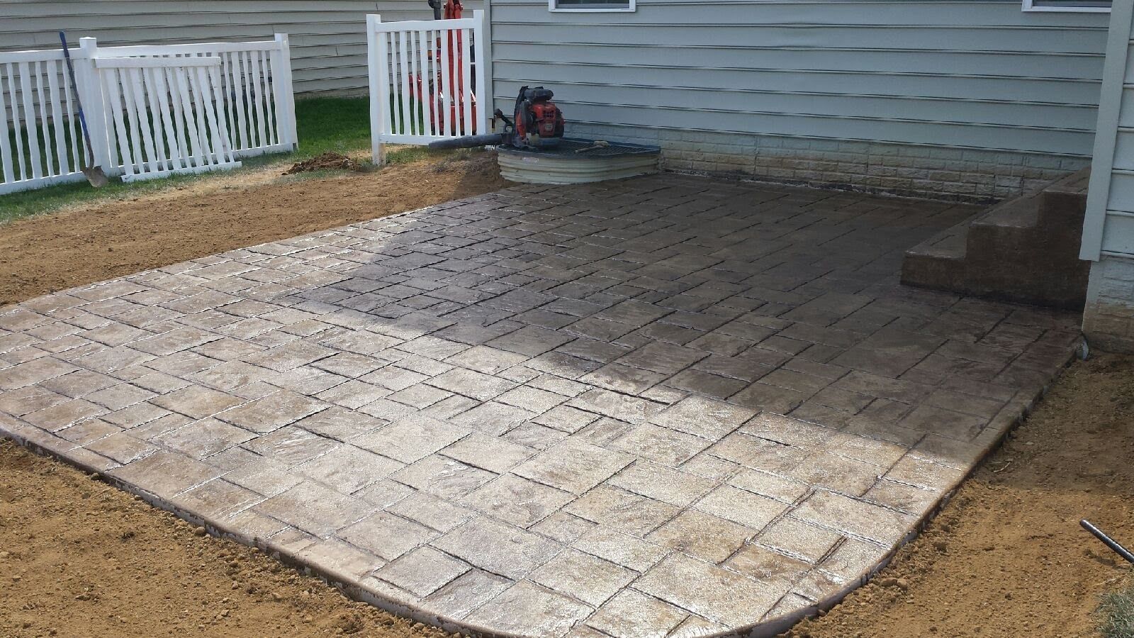 Backyard patio with stamped concrete