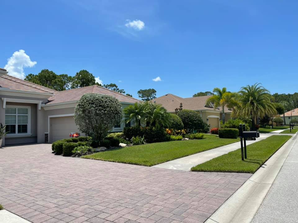 A row of houses with a mailbox on the side of the road