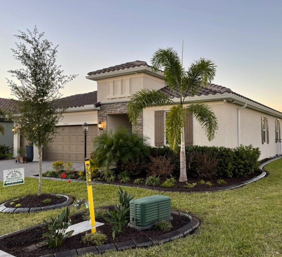 A house with a sign in front of it that says