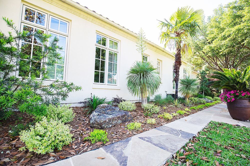 A white house with a walkway