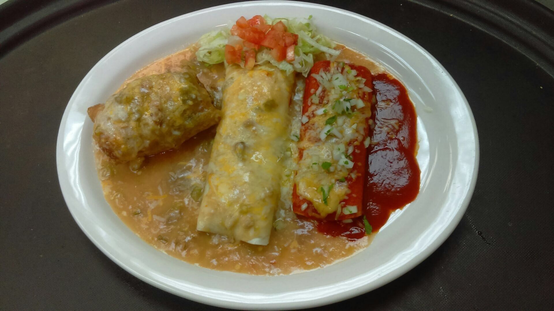 A close up of a plate of food on a tray