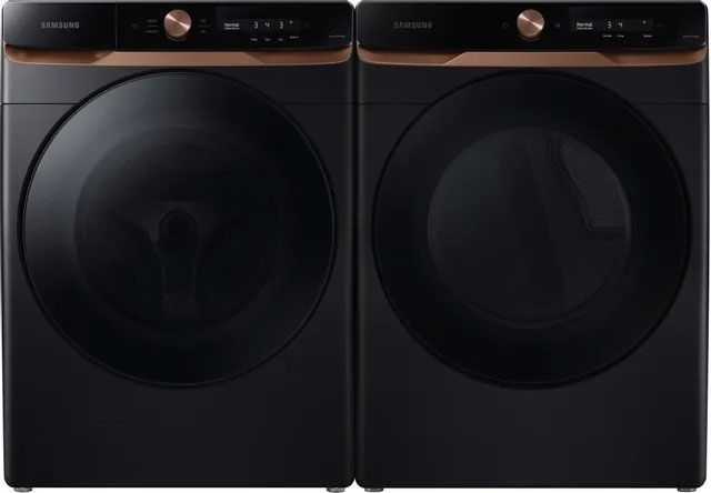 A black washer and dryer are sitting next to each other