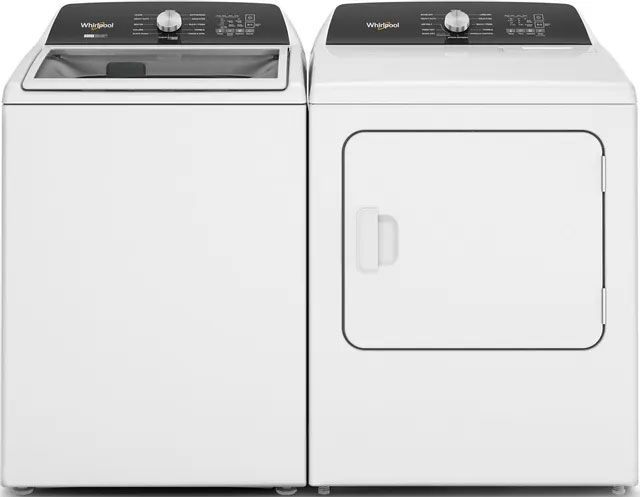 A white washer and dryer are sitting next to each other.