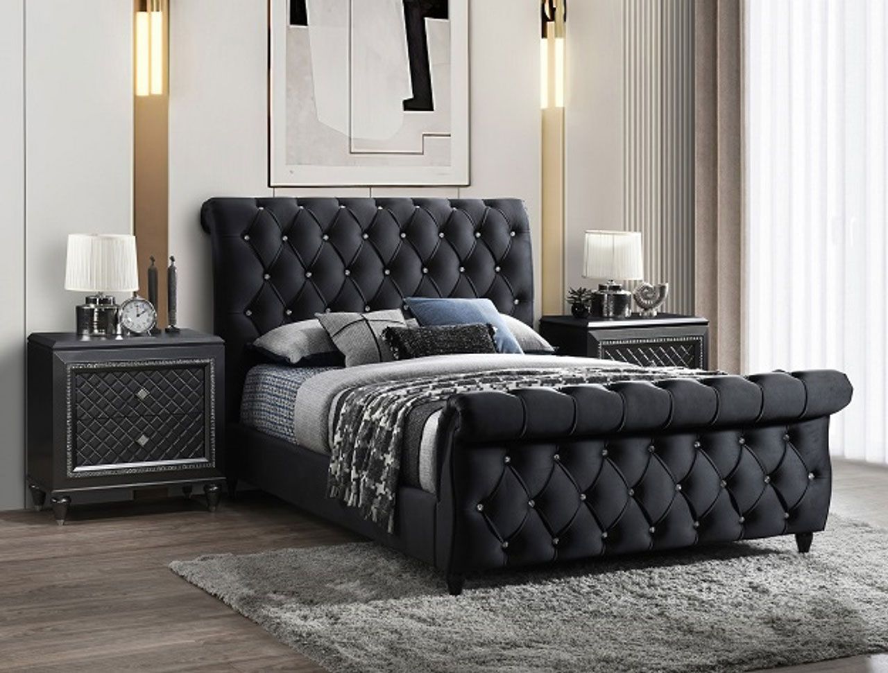 A bedroom with a black bed , nightstand , and rug.