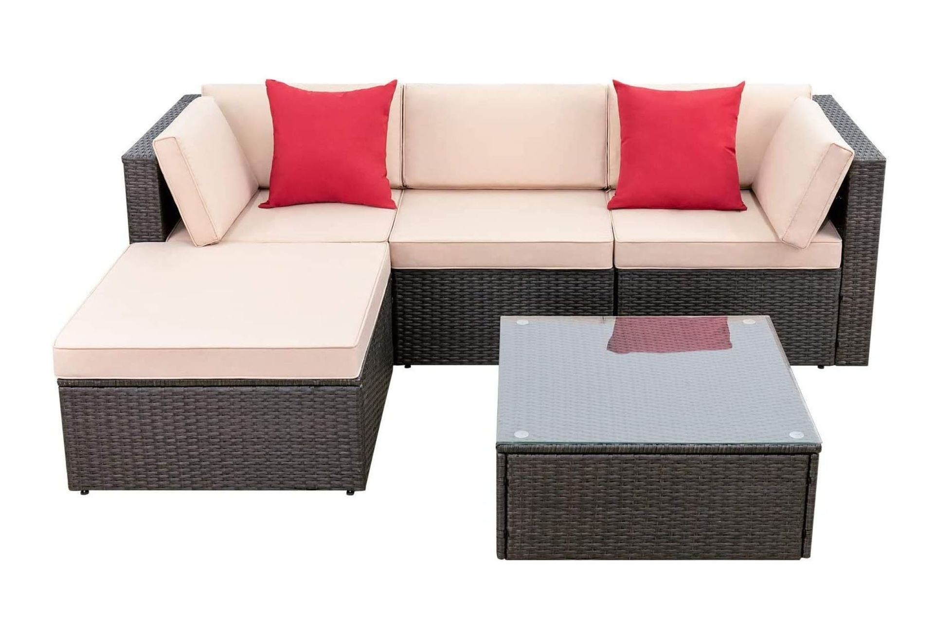 Wicker outdoor sectional sofa with beige cushions and red throw pillows, a matching coffee table, against a white backdrop.