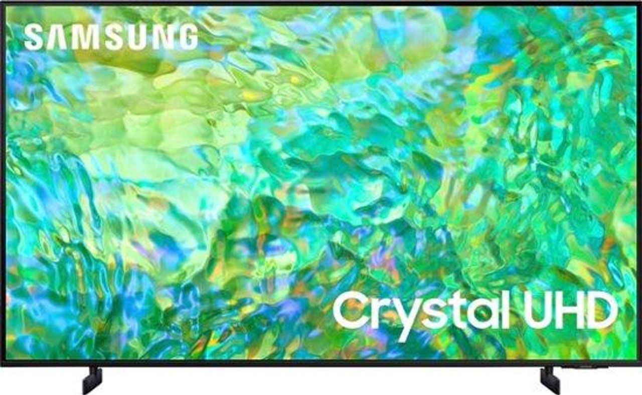 A samsung crystal uhd tv with a green and blue background.