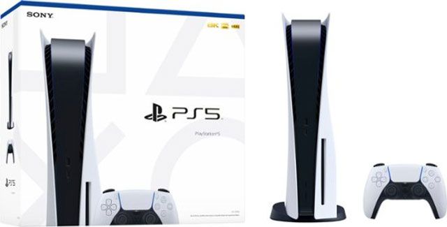 A ps5 is sitting next to its box and controller.