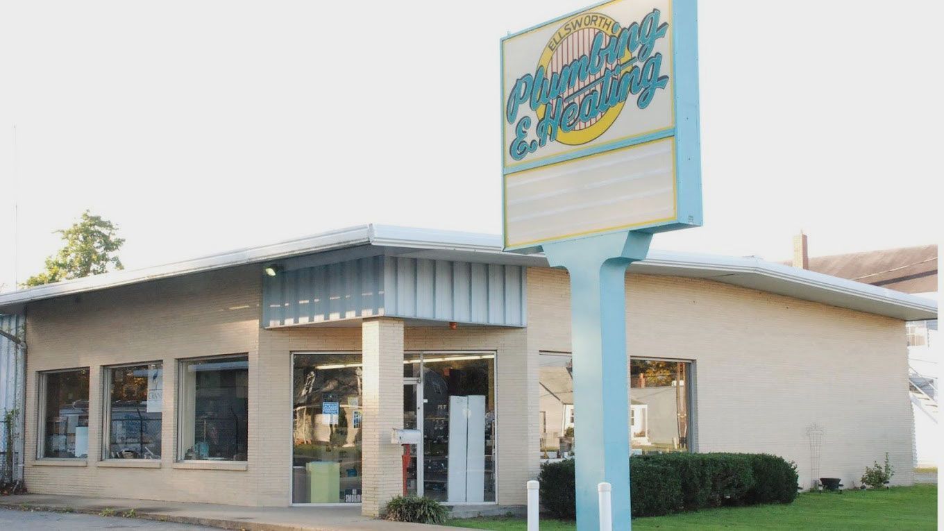 A store front with a sign that says ' swimming & diving ' on it