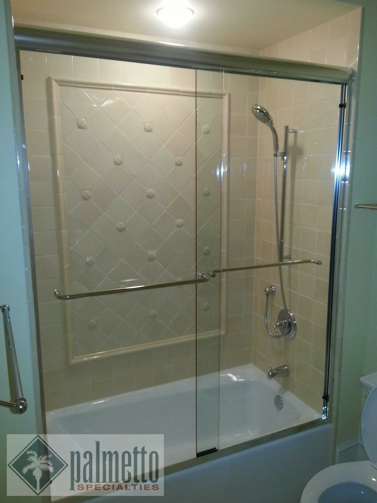 A bathroom with a bathtub and a palmetto logo