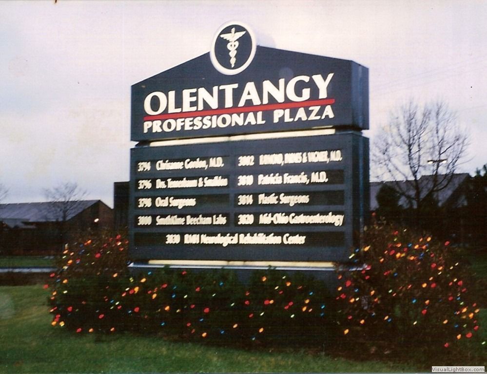Sign for Olentangy Professional Plaza with medical offices listed.