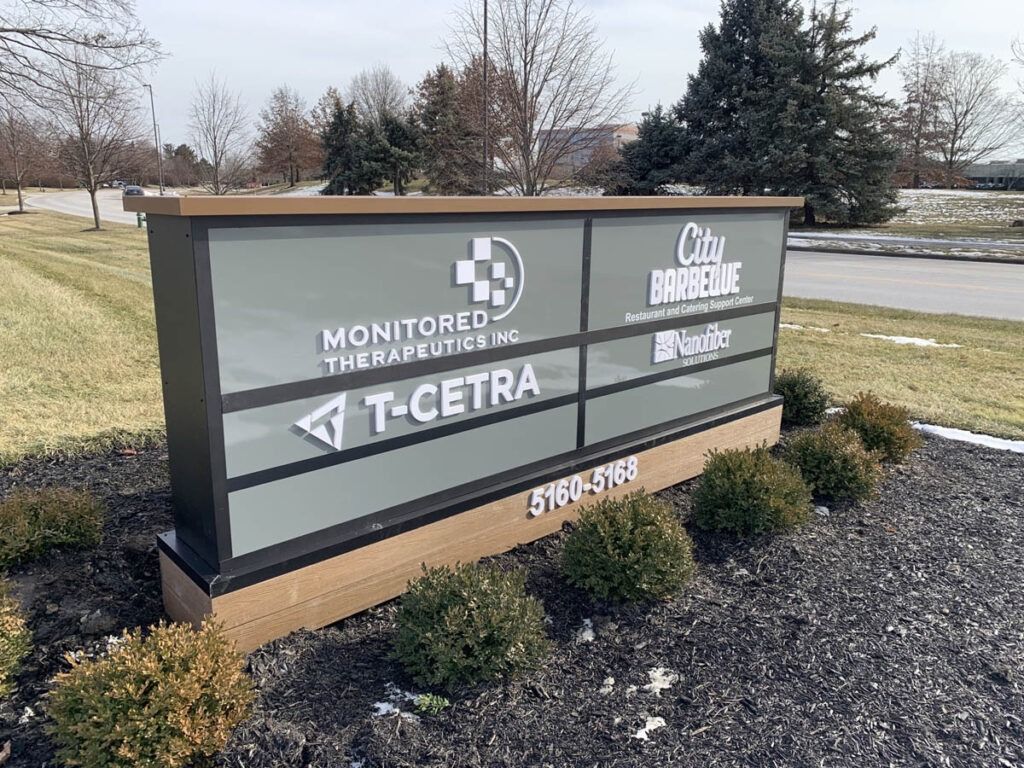Sign for office buildings with company names: Monitored Therapeutics, City Barbecue, T-Cetra.  5901-5919 address.