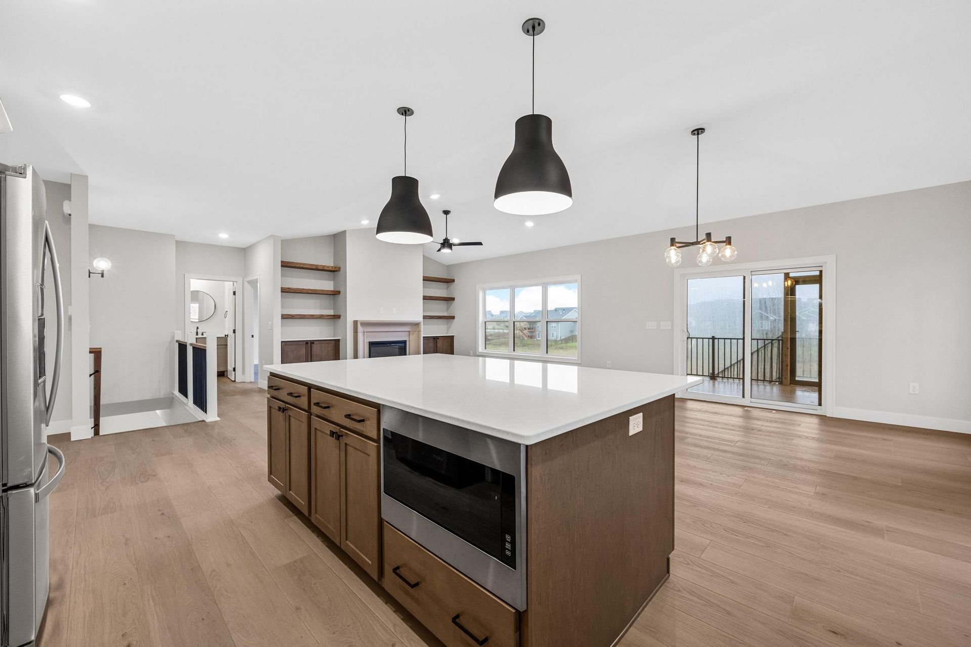 There is a large island in the middle of the kitchen.
