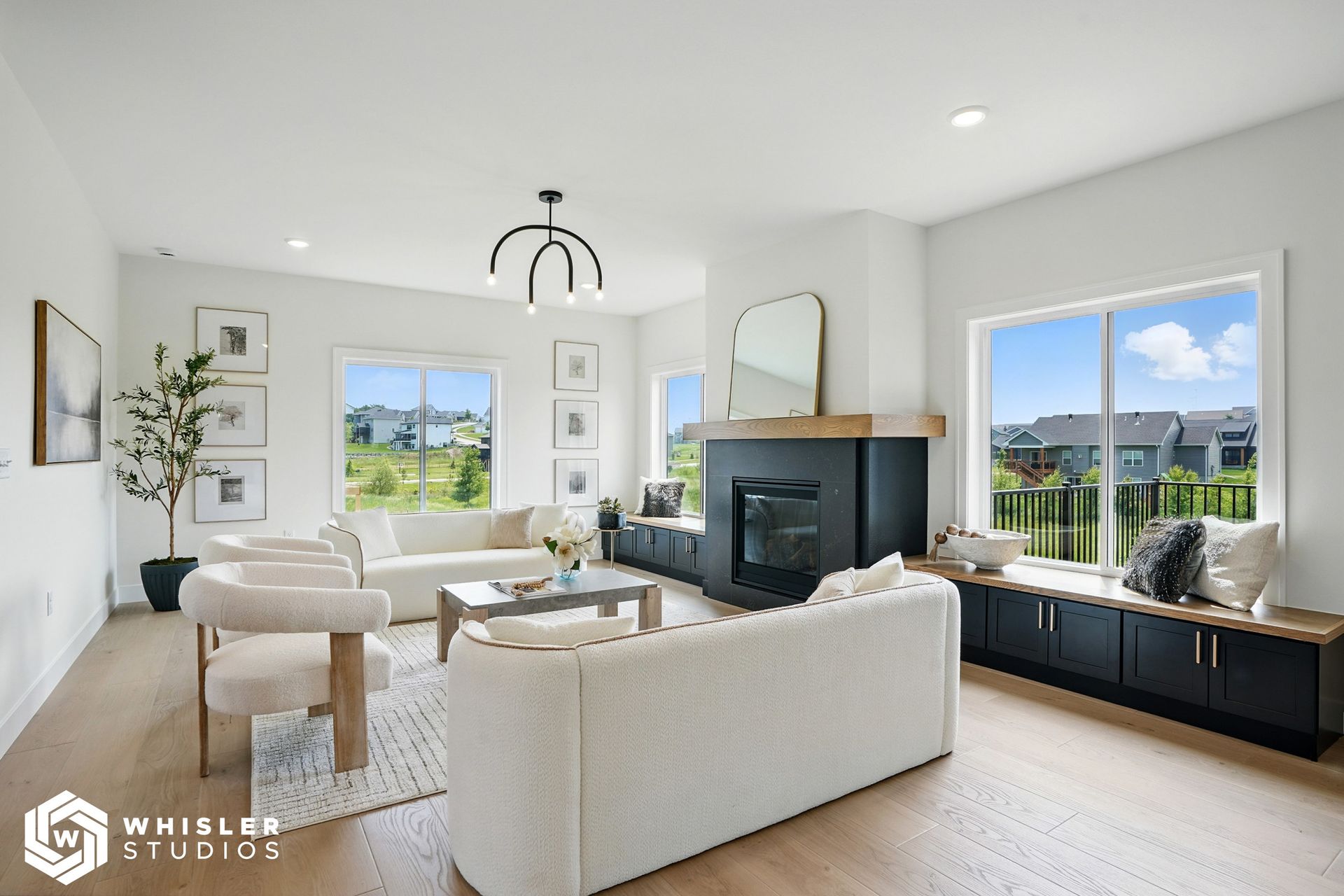 A living room filled with furniture and a fireplace.