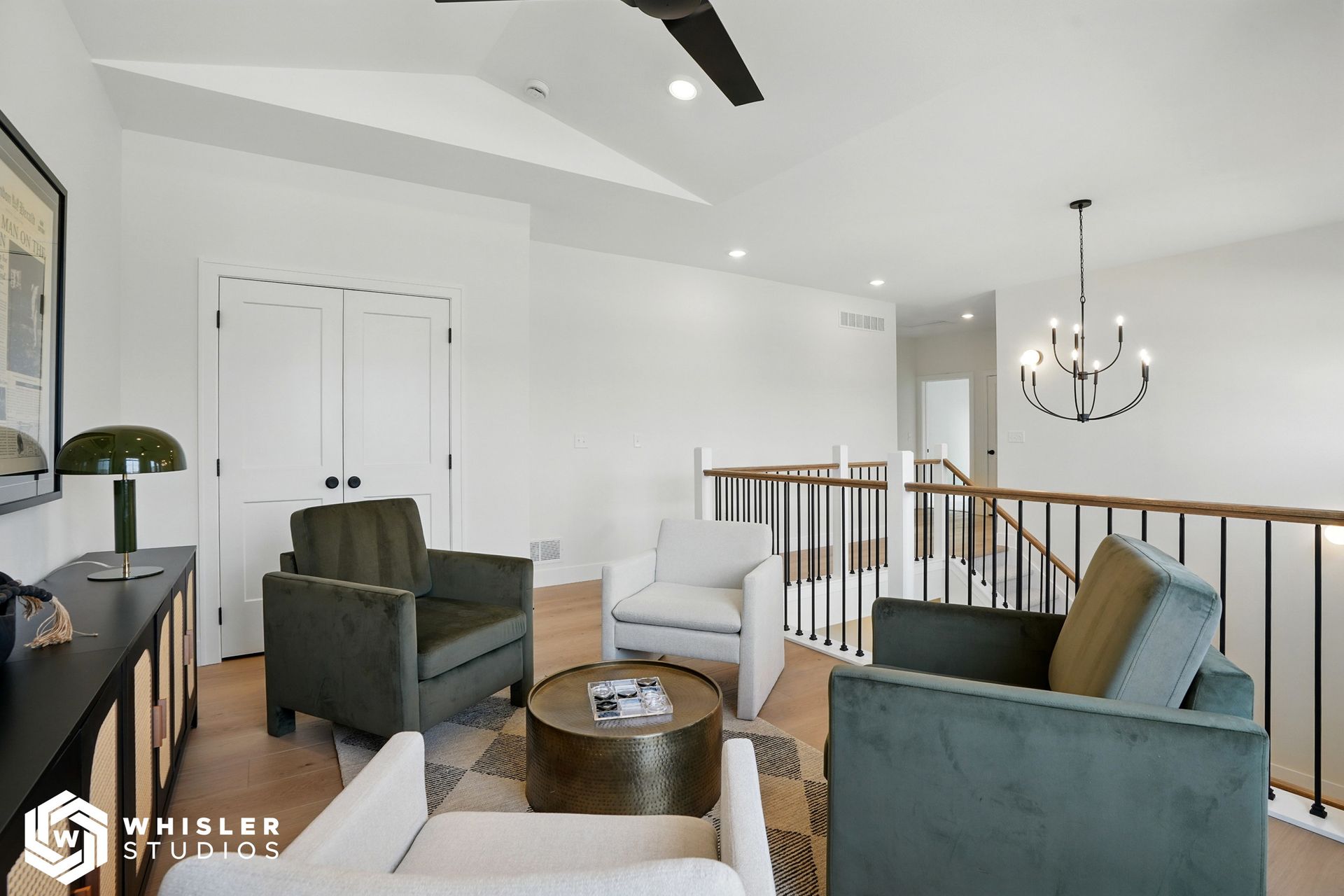 A living room with two chairs and a coffee table