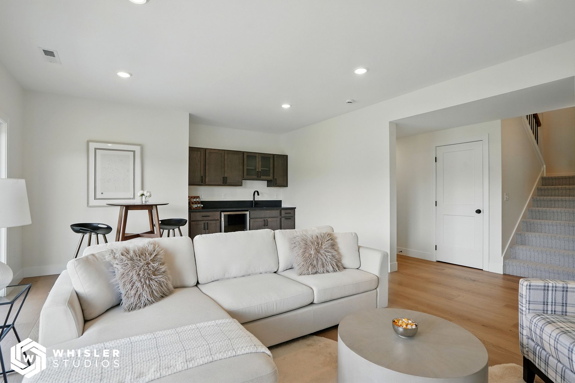 A living room with a couch and a coffee table